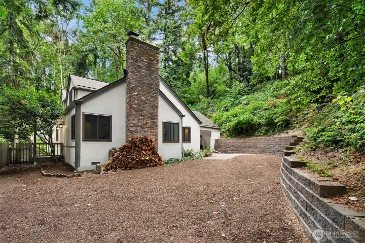 Back of the house. The retaining wall is new.