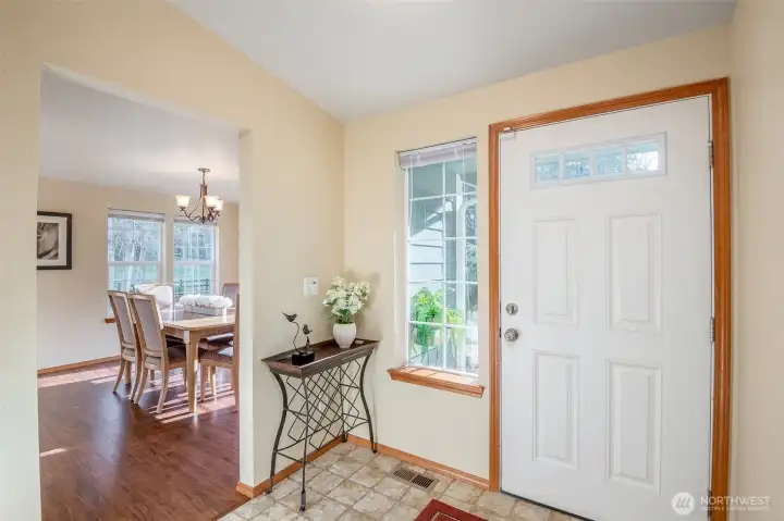 Glowing entry way, leading to an easy transition from entry to kitchen and dining.