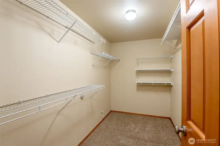 Large walk-in primary closet for any organizers dream!