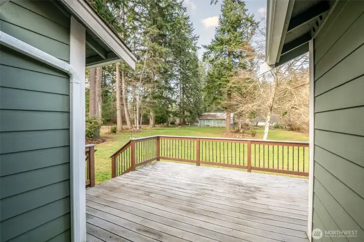 Beautiful fenced decking, perfect for an entertaining space or a space to enjoy the backyard greenery.