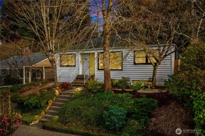 Beautiful landscaping surround this renovated 1940's Ravenna Bungalow. A quiet-established neighborhood with off street parking, fully fenced in yard and a striking evergreen tree in the backyard.