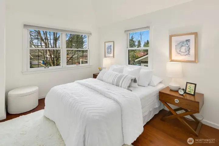 Primary bedroom with ensuite full bath and walk in closet.