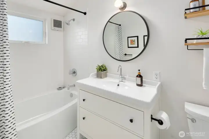 Updated primary bathroom en-suite, with heated floors.