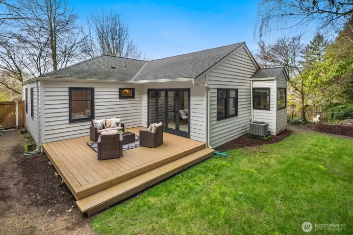 French doors off the dining room to the deck and the private-fully fenced in backyard.