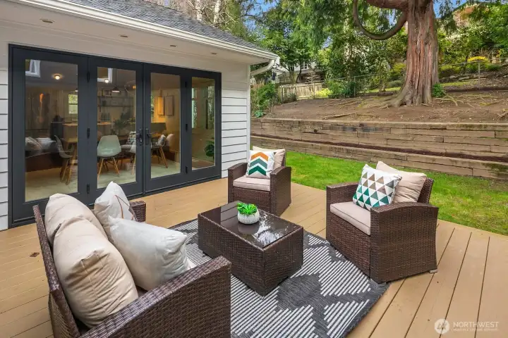 French doors off the dining room to the deck and the private-fully fenced in backyard.