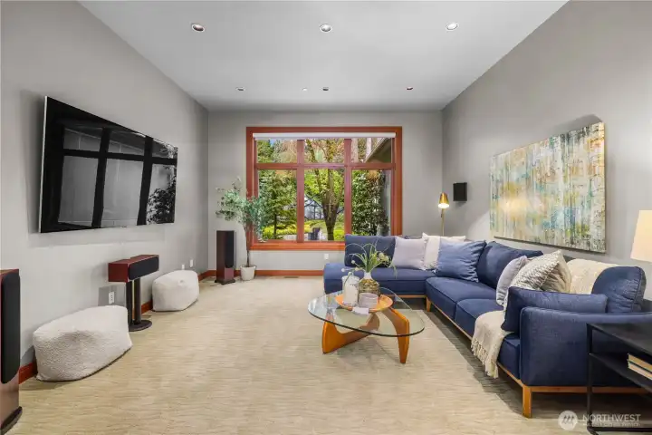 The perfect space to unwind—dedicated media room designed for movie nights, game days, and relaxed evenings at home.