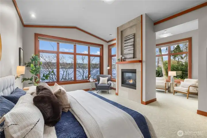 A true retreat—wake to lake views, unwind by the fire, and enjoy a private sitting area designed for relaxation.