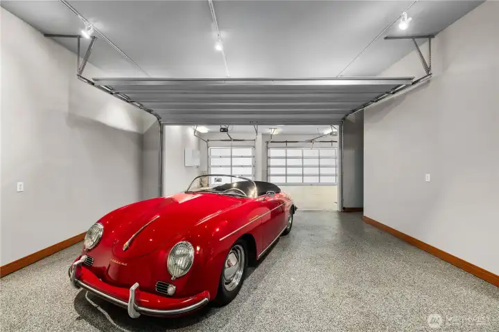 2-car auto gallery plus 3-car garage offering 1,200+ sq ft of enclosed parking and storage.