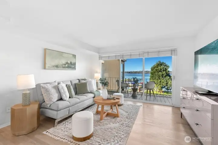 This light-filled penthouse features an updated kitchen and bath, new flooring, and the convenience of an in-unit washer and dryer.