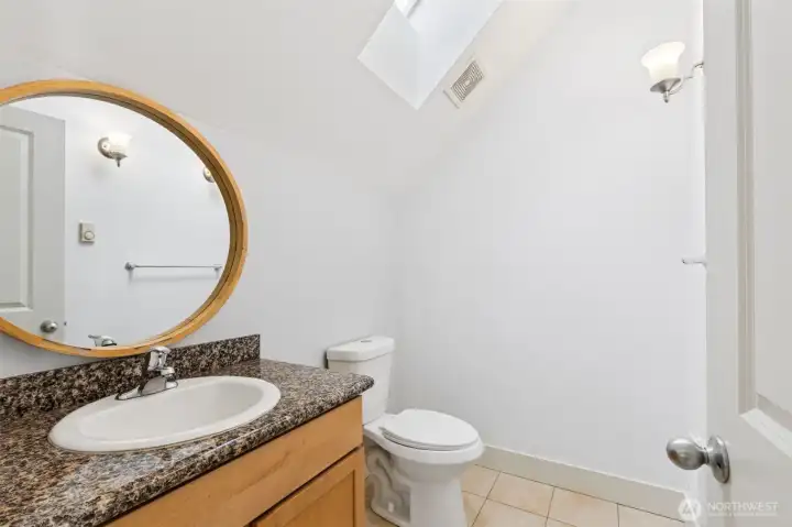 Convenient main-level half bath for guests.