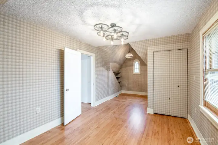 So many fun angles and features to this bedroom