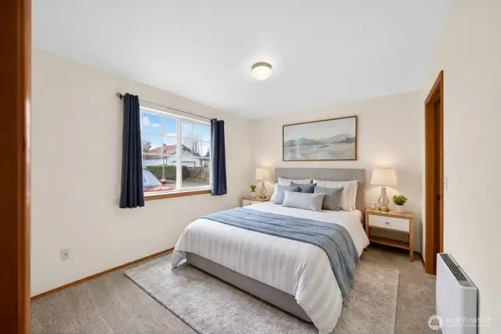 Retreat to the primary suite with quiet, comfortable heat and a well-appointed walk-in closet.