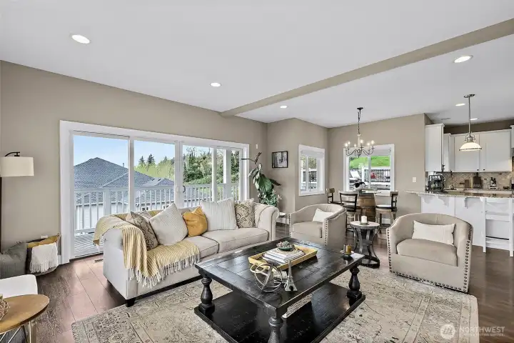 Automatic sun shades across sliding glass doors