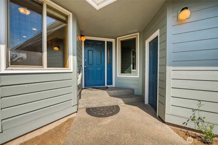 Front door. Garage entry door is on the right.