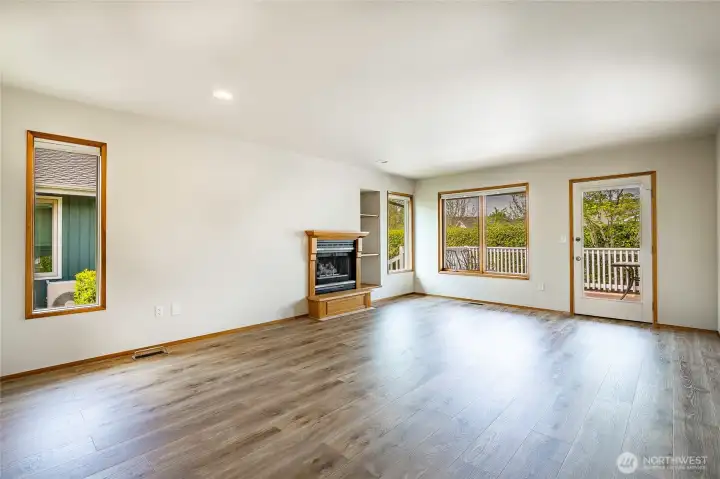 Living room with gas fireplace.