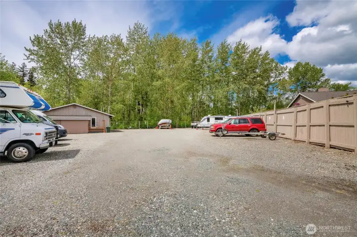 Fully fenced RV & Boat parking onsite.