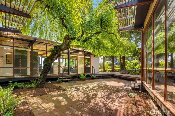 Surrounded by nature & so private this impeccable mid-century home is the perfect retreat. Surrounded by nature & so private this impeccable mid-century home is the perfect retreat.
