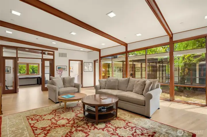 Stylish woodwork & walls of windows throughout. New shades on all windows are also included. Stylish woodwork & walls of windows throughout. New shades on all windows are also included.