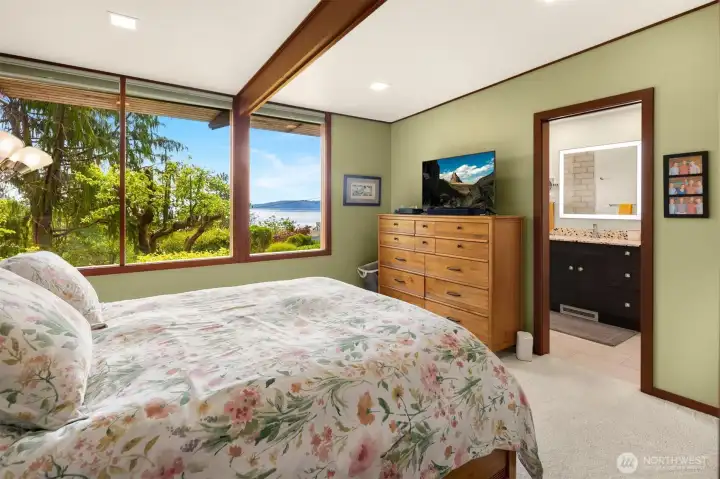Check out those views from the primary bedroom!! Relax in bed with your coffee and take in the beauty. Check out those views from the primary bedroom!! Relax in bed with your coffee and take in the beauty.