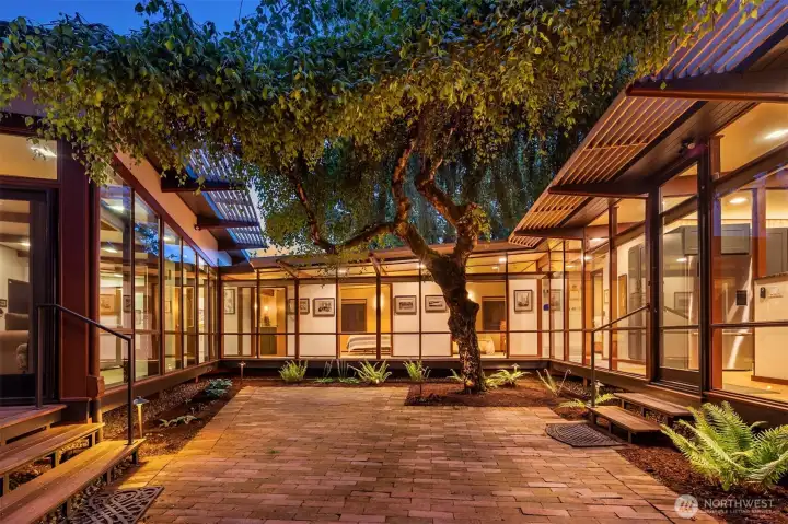 Updated outdoor lighting adds to the evening beauty of the landscaping. Updated outdoor lighting adds to the evening beauty of the landscaping.