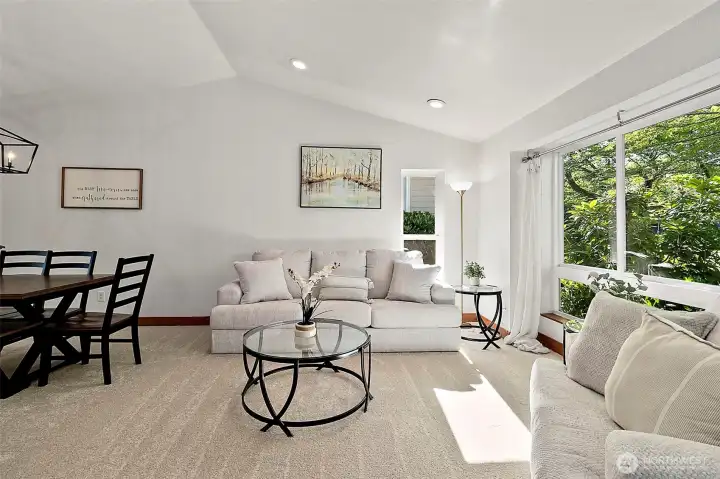 Vaulted ceilings over the living and dining room area. Vaulted ceilings over the living and dining room area.