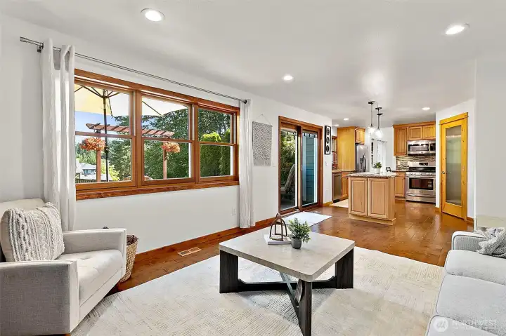The open-concept living area flows seamlessly into the kitchen, creating an ideal space for entertaining. The open-concept living area flows seamlessly into the kitchen, creating an ideal space for entertaining.