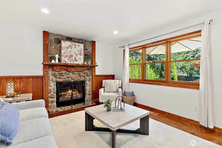 Spacious open-concept living area featuring a cozy gas fireplace and an excellent, intuitive flow throughout the home. Spacious open-concept living area featuring a cozy gas fireplace and an excellent, intuitive flow throughout the home.