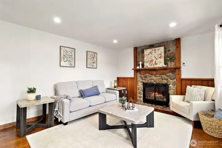 This home features warm wood tones complemented by sophisticated dark accents throughout the interior. This home features warm wood tones complemented by sophisticated dark accents throughout the interior.