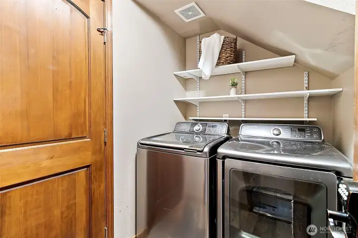 Main floor laundry room includes washer and dryer. Main floor laundry room includes washer and dryer.