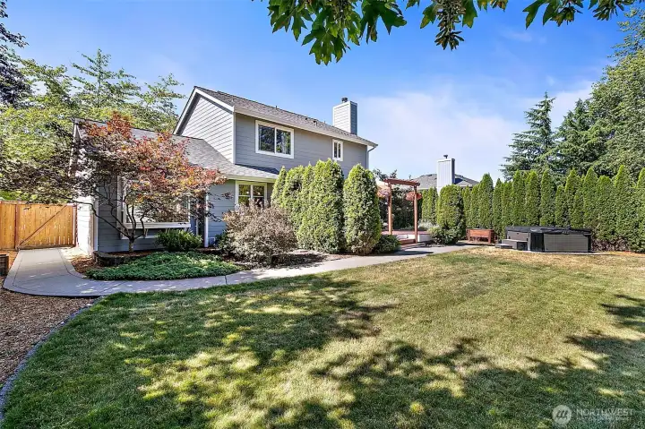 This spacious backyard features mature trees, providing excellent shade and complete privacy. This spacious backyard features mature trees, providing excellent shade and complete privacy.