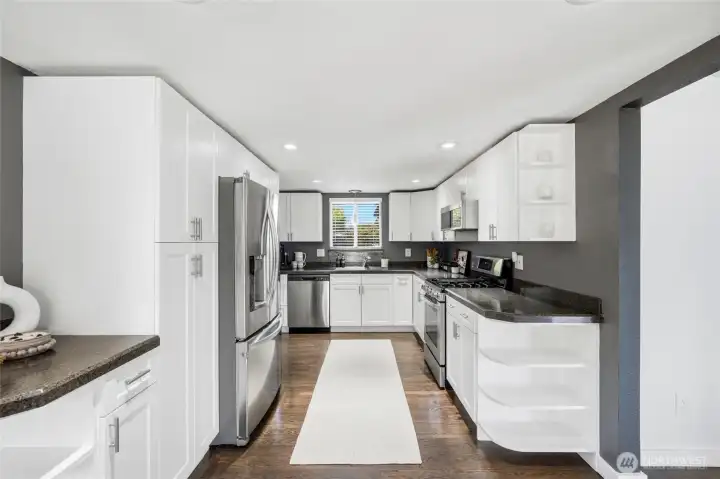 spacious kitchen opens to the large dining area