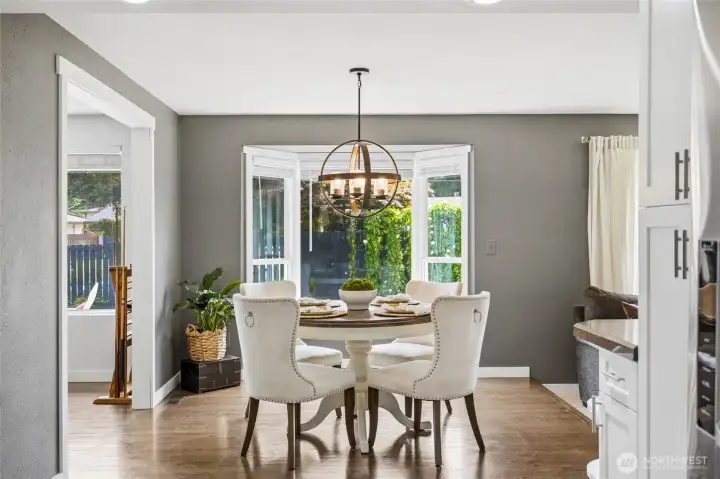 Dining room open to both the living room and the large bonus room