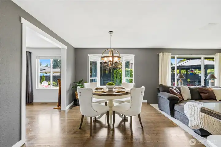 What a dreamy space, so light and bright! Plenty of room for a larger table too!