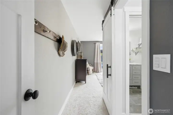 super charming entry to the primary suite, it feels like its own separate space, very private