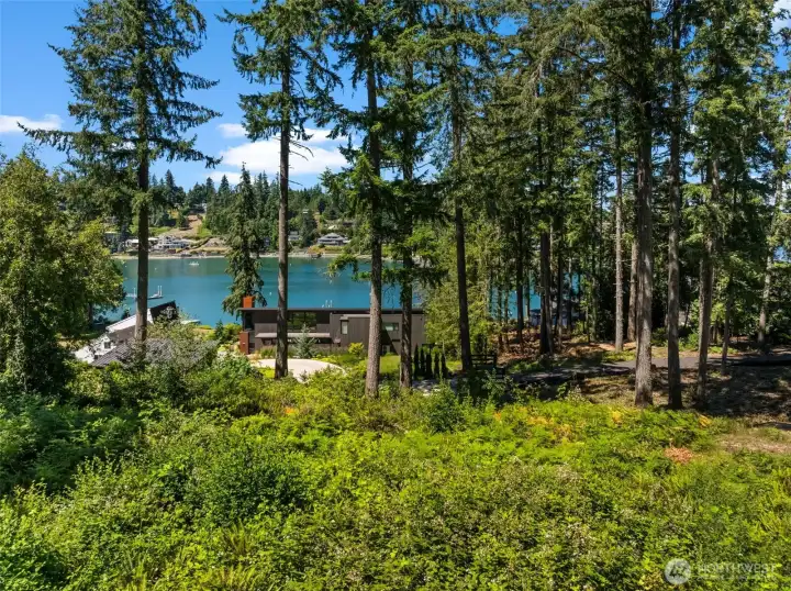 Take in sweeping views of Raft Island and the sparkling waters of Wollochet Bay - the perfect setting to build your dream home. Take in sweeping views of Raft Island and the sparkling waters of Wollochet Bay - the perfect setting to build your dream home.