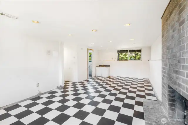 The rec room also features a wood burning fireplace. It's a great space for play, relaxing, or entertaining.