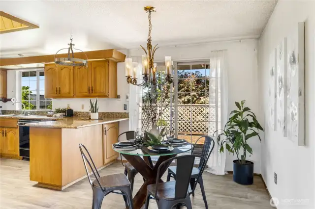 The dining room sits adjacent to the kitchen, and leads out to the deck in back (please use caution on the deck).
