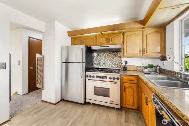 Enjoy a view of the backyard and trees through the window over the kitchen sink!