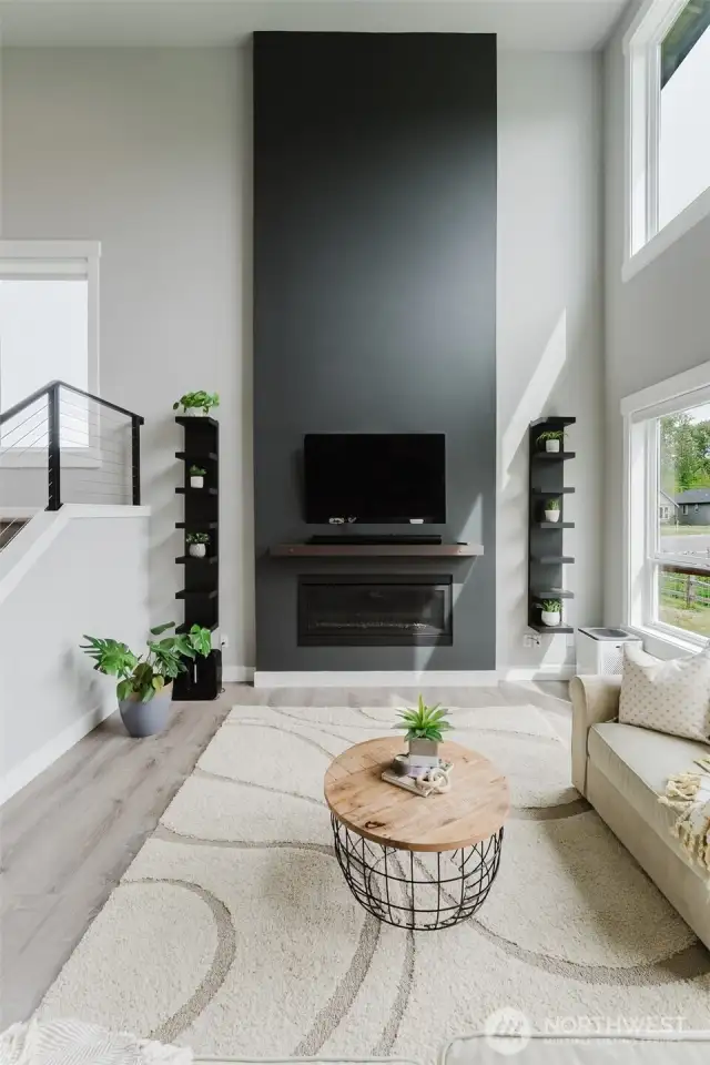 Gas fireplace and wired inset for TV or art make this living room ready for entertaining.