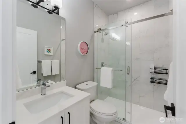First floor bathroom with tiled shower