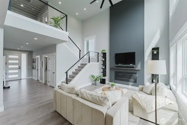 19' vaulted ceilings to second floor loft create and open and grand feel