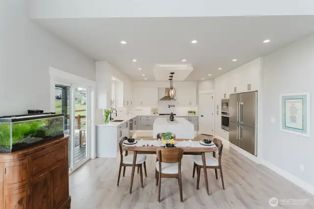 Open dining room space between the living room and kitchen