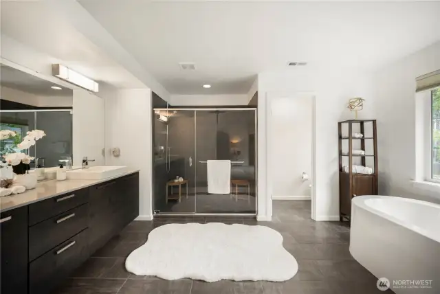 Luxurious spa inspired bath in primary suite