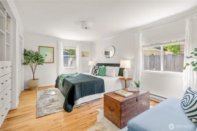 spacious upstairs bedroom 1 fits a king bed and a seating area