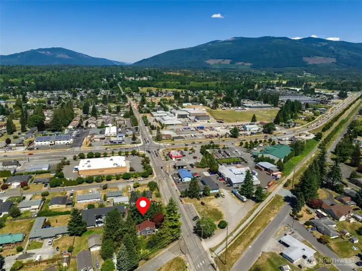 A bird’s-eye view highlights the convenient in-town location, close to shops, dining, and schools.