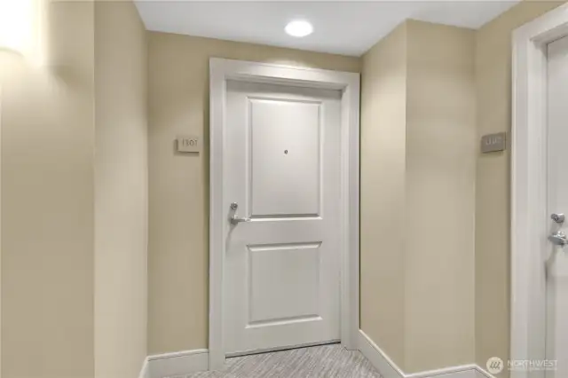 entry door to Unit 1101 at The Cosmopolitan in Seattle.