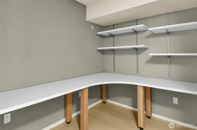 Den is ideal for remote work or a study nook.