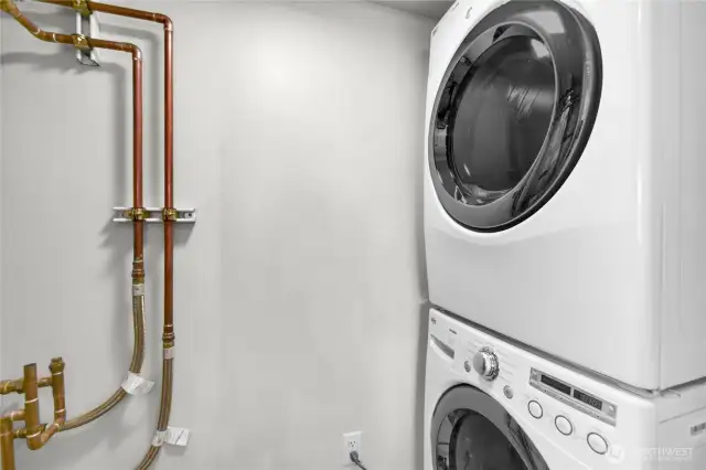 In Unit Laundry.  A modern, front-loading stacked washer and dryer provide maximum efficiency while saving space.