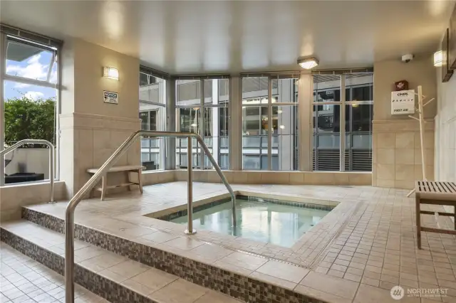 Sauna & Steam: To the left, a cedar-lined sauna provides additional spa-quality wellness right at home.