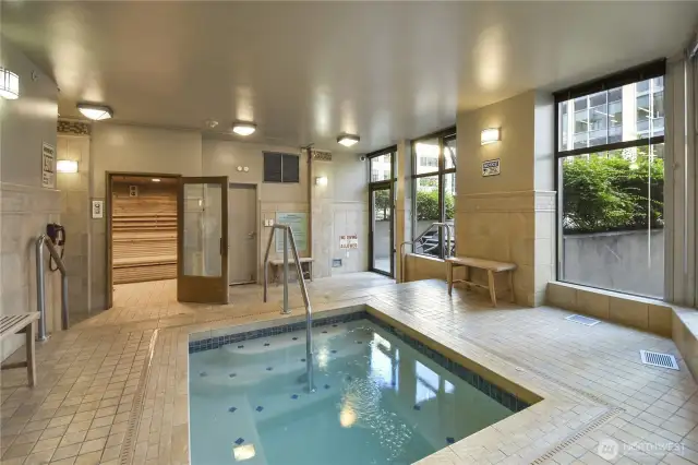 A beautifully tiled indoor hot tub offers a serene retreat